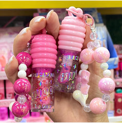 جلوس بلون زهري فاتح سحري لامع مع ميدالية أنيقة – Sweet Lip Gloss Cos-220426-23